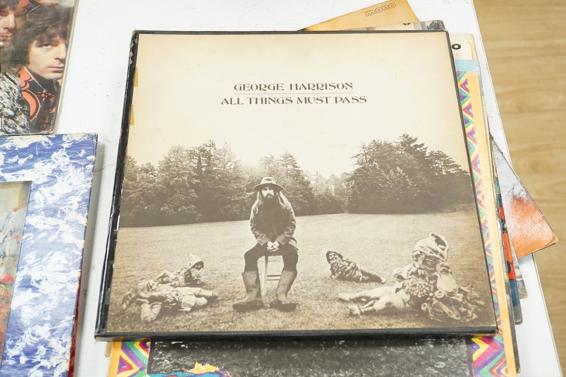 Eleven LP record albums including nine The Beatles and related albums; Beatles For Sale, Hey Jude, Yellow Submarine, All Things Must Pass, etc., together with the Rolling Stones; Their Satanic Majesties Request, and Pink